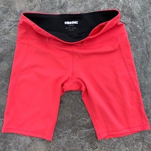 Coral compression running shorts. Never worn.